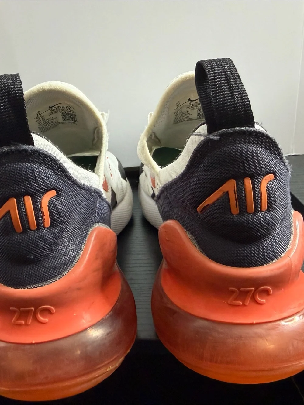 Nike Kids White Sneakers with Black, Orange and Green Accents